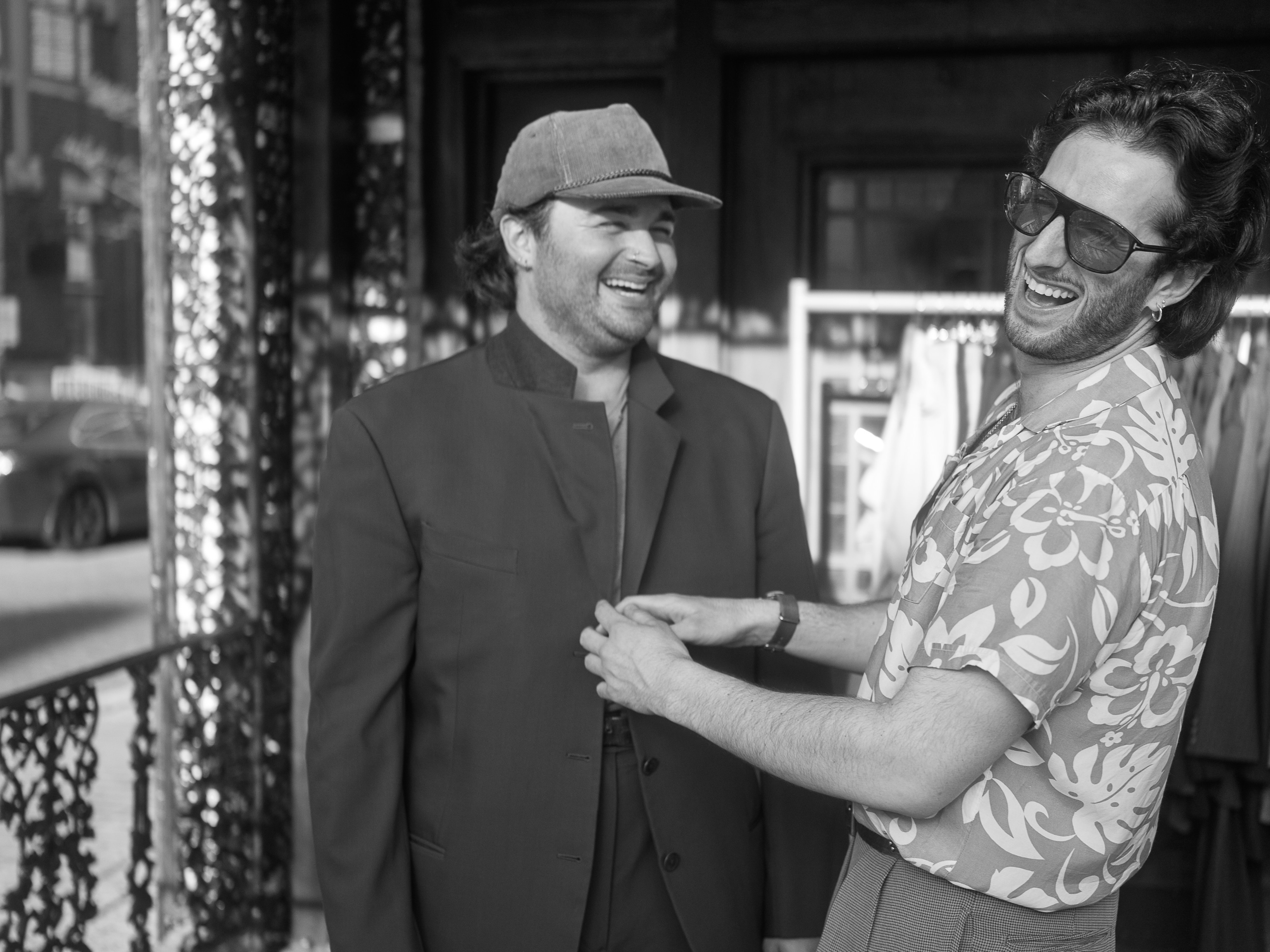 Parv and Donovan laughing in vintage menswear